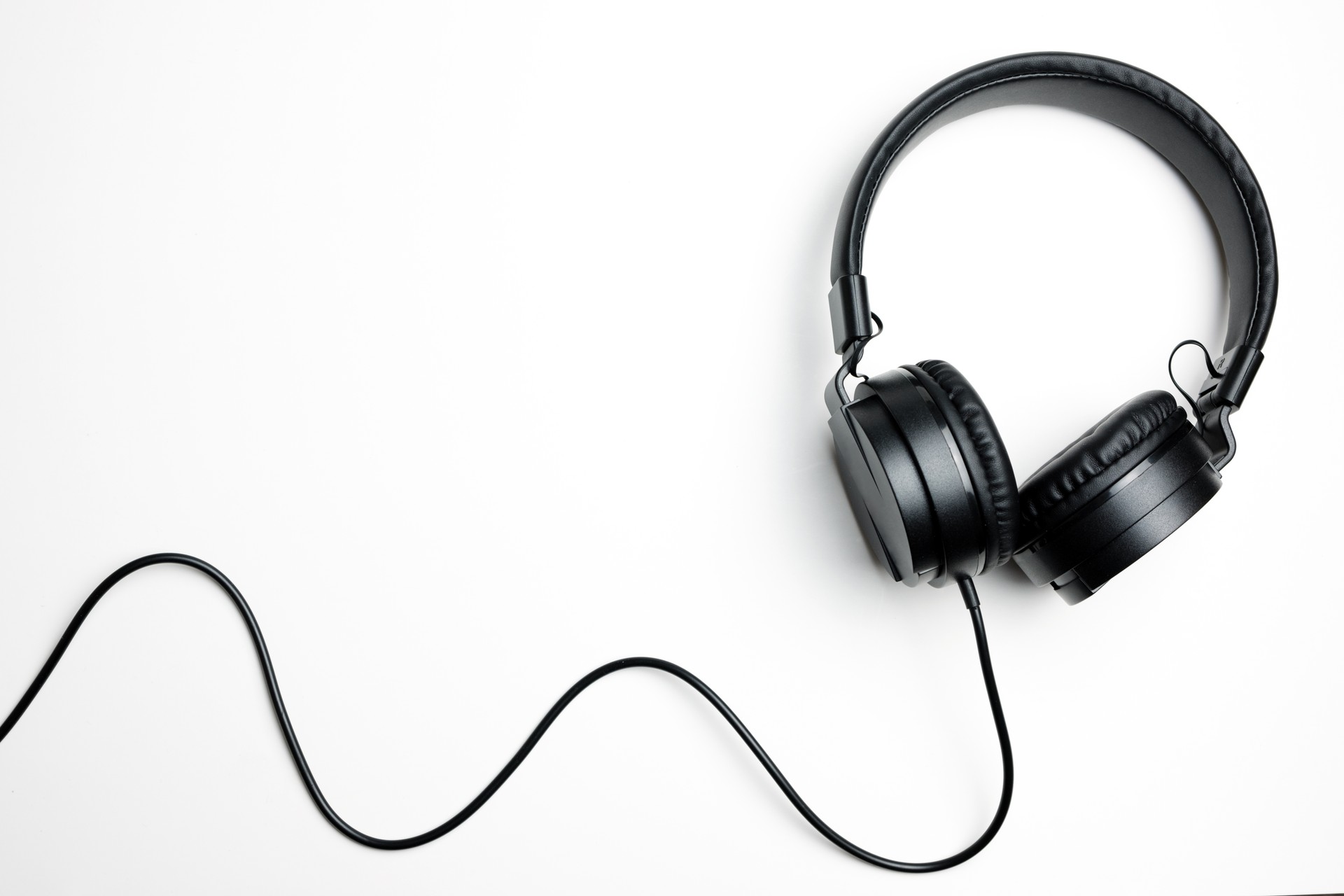 Black headphones isolated on the white background